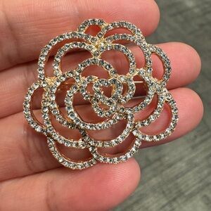 Elegant Gold and Silver Floral Brooch